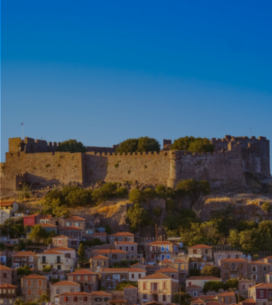 Molyvos village, stone houses cascading down to the Aegean sea, Lesvos